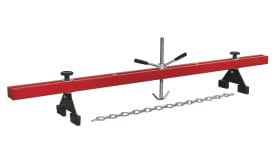 Heavy-duty chain hoist beam trolley with adjustable hooks and sturdy red frame for lifting and moving loads efficiently.