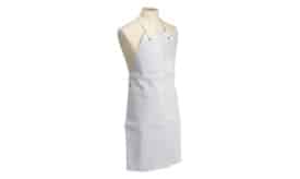 White cotton kitchen apron with adjustable neck and waist ties, suitable for cooking and baking tasks in the kitchen.