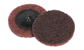 Red scouring pad with black backing, ideal for cleaning and scrubbing surfaces, featuring a durable design for effective use.