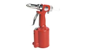 Red air riveter tool for fastening applications, featuring a trigger and air pressure mechanism, suitable for various metalworking tasks.