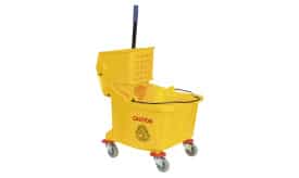 Yellow mop bucket with wringer and caution sign, designed for efficient cleaning and maintenance tasks in commercial spaces.