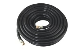 Coiled black rubber hose with metal connectors, suitable for various applications including gardening and industrial use.