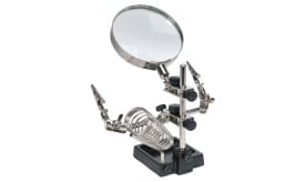 Magnifying glass with adjustable helping hands and spring holder for precision tasks in electronics and crafts.