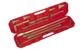 A comprehensive set of metal tools in a red plastic case, featuring various shapes and sizes for precise work and repairs.