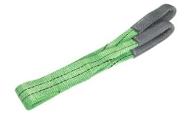 Green lifting sling with reinforced ends, suitable for heavy lifting and rigging applications, made from durable synthetic material.
