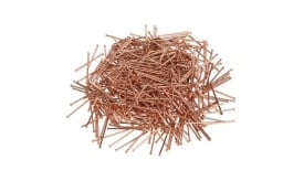 A large pile of copper nails, showcasing their shiny finish and uniform length, ideal for various construction and crafting projects.