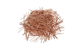 A large pile of copper nails, showcasing their shiny finish and uniform length, ideal for various construction and crafting projects.