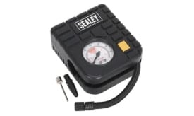 Sealey portable air compressor with pressure gauge and accessories for inflating tyres and sports equipment.