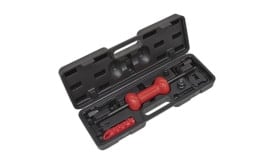 Red and black tool kit set featuring a central tool and various attachments in a sturdy case for maintenance and repair tasks.