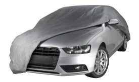 Silver car covered with a grey protective cover, showcasing a sleek design and modern features, ideal for vehicle protection.