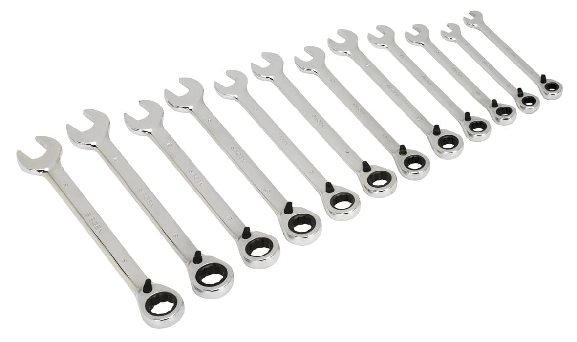 A comprehensive set of chrome wrenches arranged in a row, featuring various sizes for versatile use in mechanical tasks.