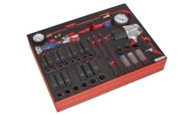 Comprehensive socket and air tool set featuring various sizes of sockets, air pressure gauge, and a pneumatic impact wrench in a storage tray.