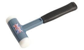 Rubber mallet featuring a sturdy handle and dual rubber heads, ideal for various tasks in woodworking and crafting.