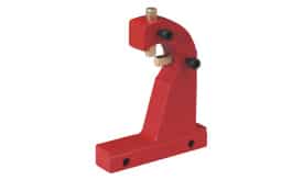 Red metal tool holder designed for workshop applications, featuring adjustable components for secure tool placement.