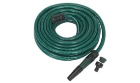Durable green garden hose with connectors for watering plants, featuring a flexible design and robust construction for easy handling.
