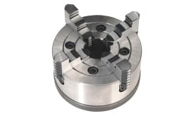 High-quality precision metal lathe chuck with three jaws for secure gripping of workpieces in machining applications.