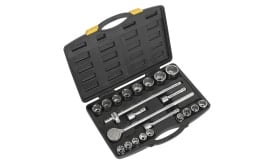 Comprehensive socket set featuring various sizes of sockets, ratchet handle, and extension bars in a sturdy black case.