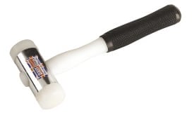 Rubber mallet with a textured handle and white rubber head, suitable for various tasks in DIY and construction.