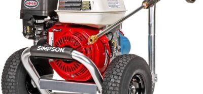 Simpson gas pressure washer with a red engine and black wheels, designed for high-performance cleaning tasks.