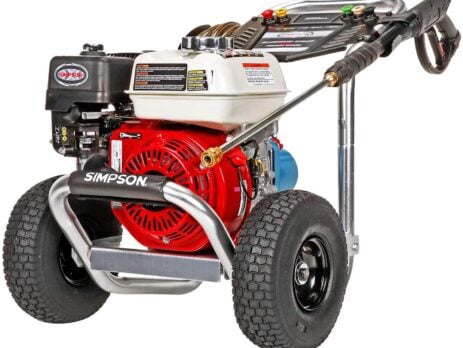 Simpson gas pressure washer with a red engine and black wheels, designed for high-performance cleaning tasks.
